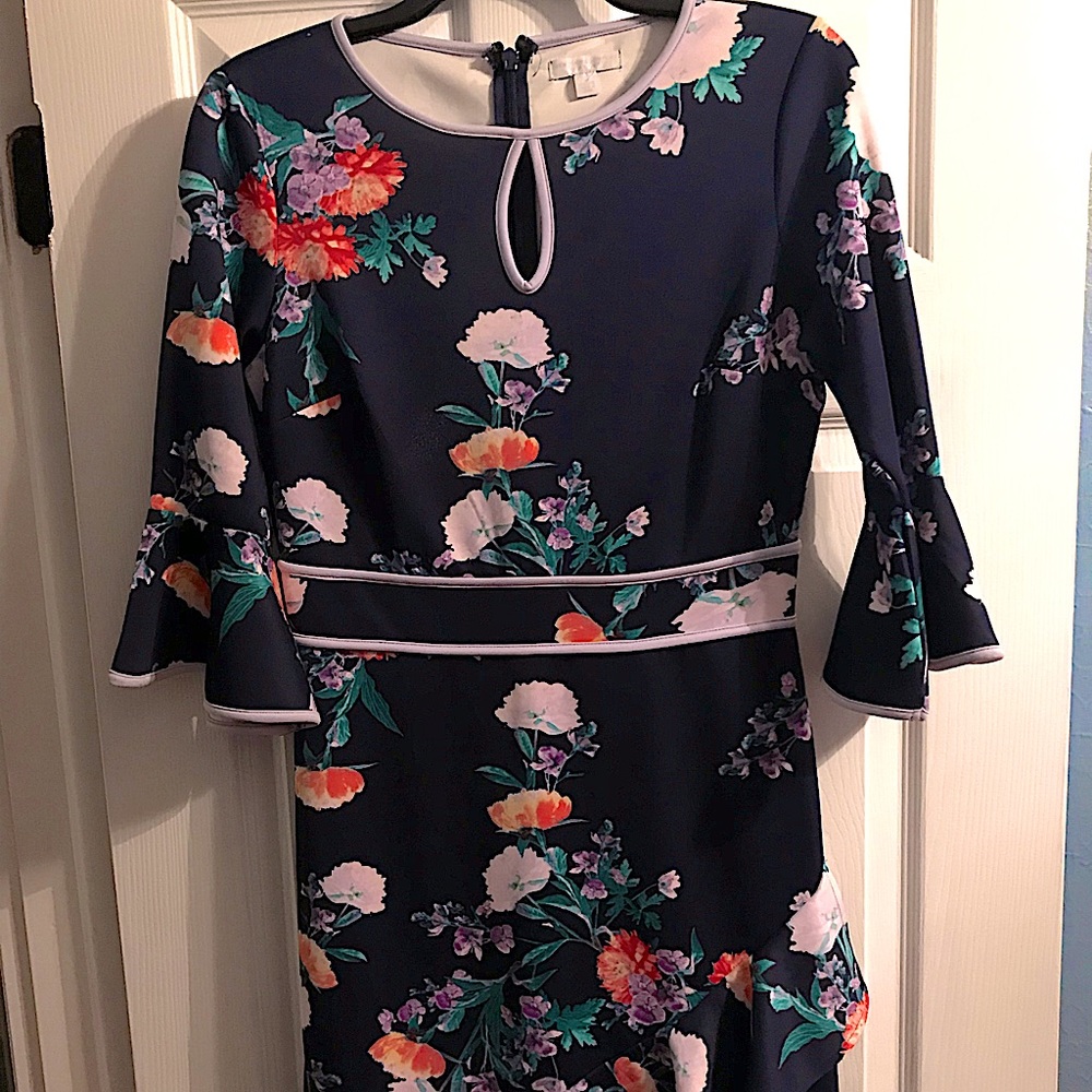 Navy blue floral ,lilac trim,bell sleeves w/ruffled asymmetrical bottom